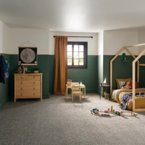 Gray Shaw Floors carpet in a warm colored kids bedroom | Brooks Flooring Services Inc